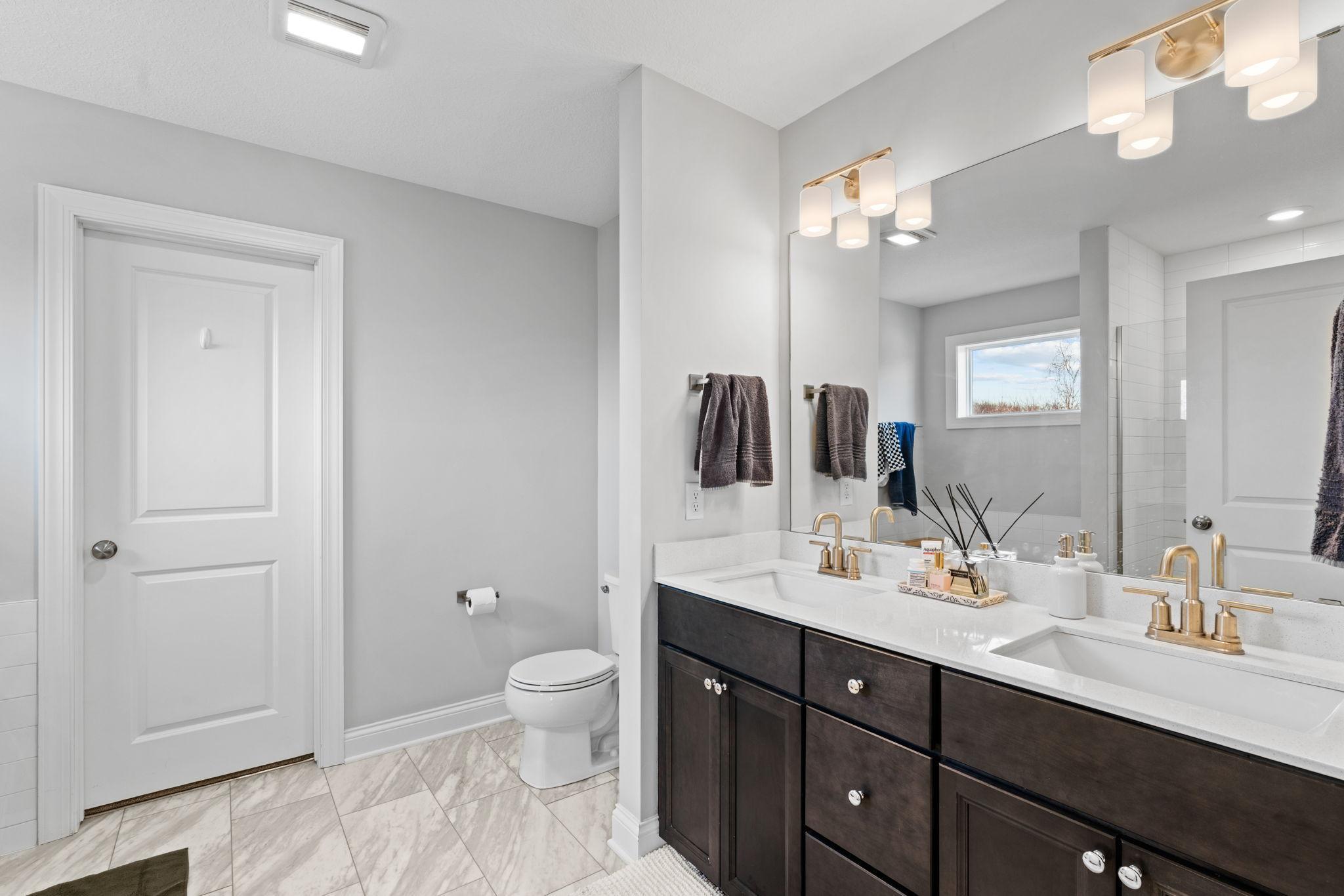Two large closets in this suite, and this huge bathroom!