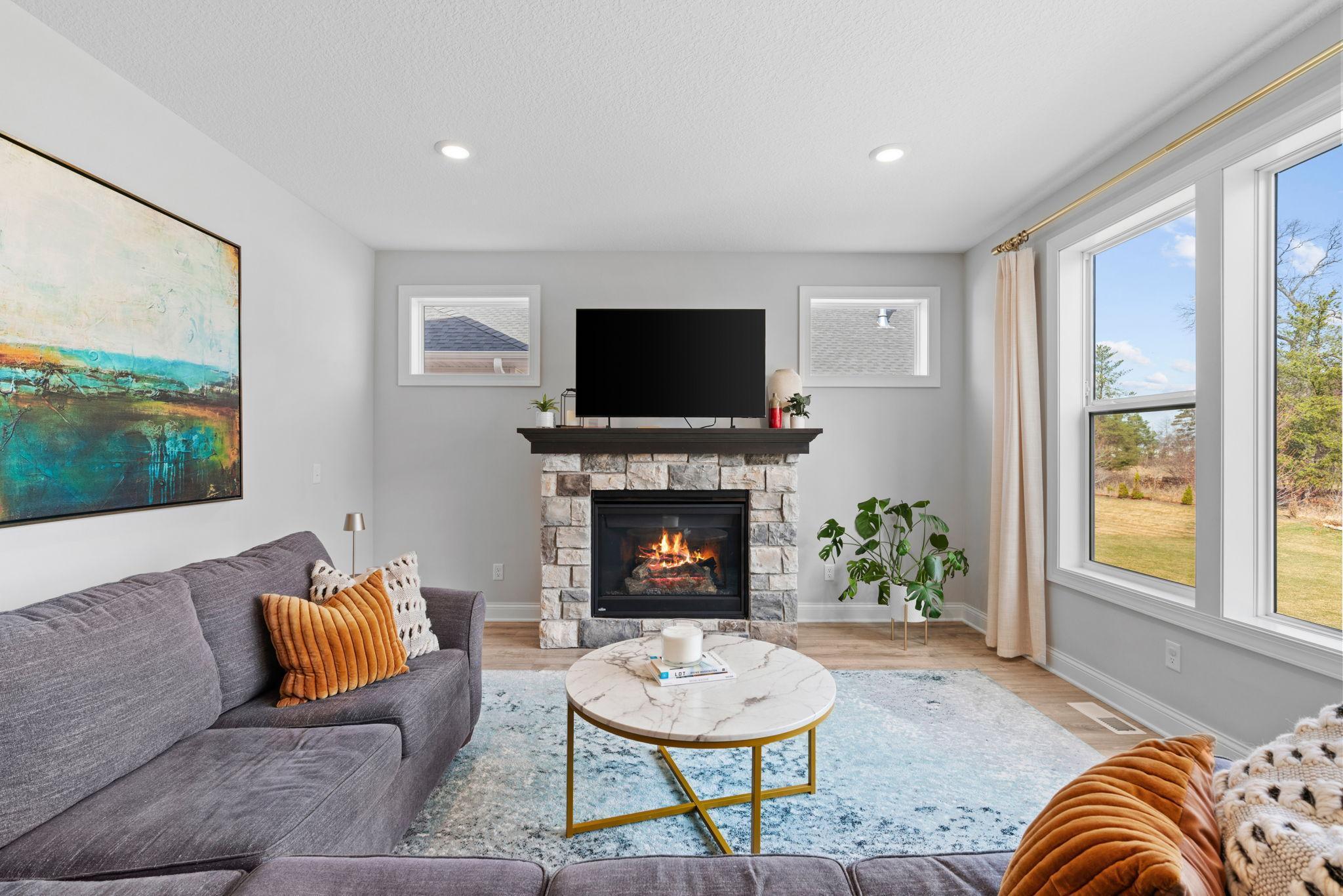 Tall ceilings and beautiful views of nature make the home feel very impressive and large.