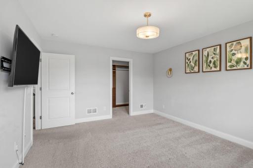 The primary suite has TWO walk-in closets and a stunning ensuite bathroom.