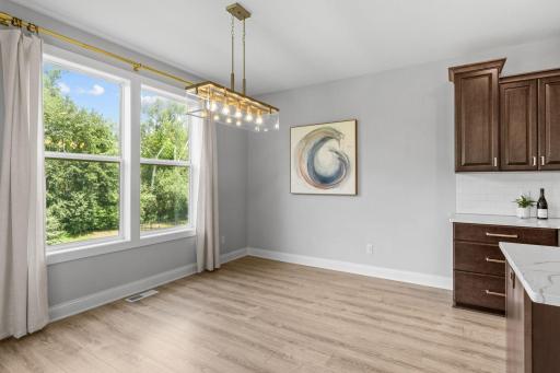 The dining room, just off the kitchen, also has the ability for a deck to be built right off of it for added outdoor living!