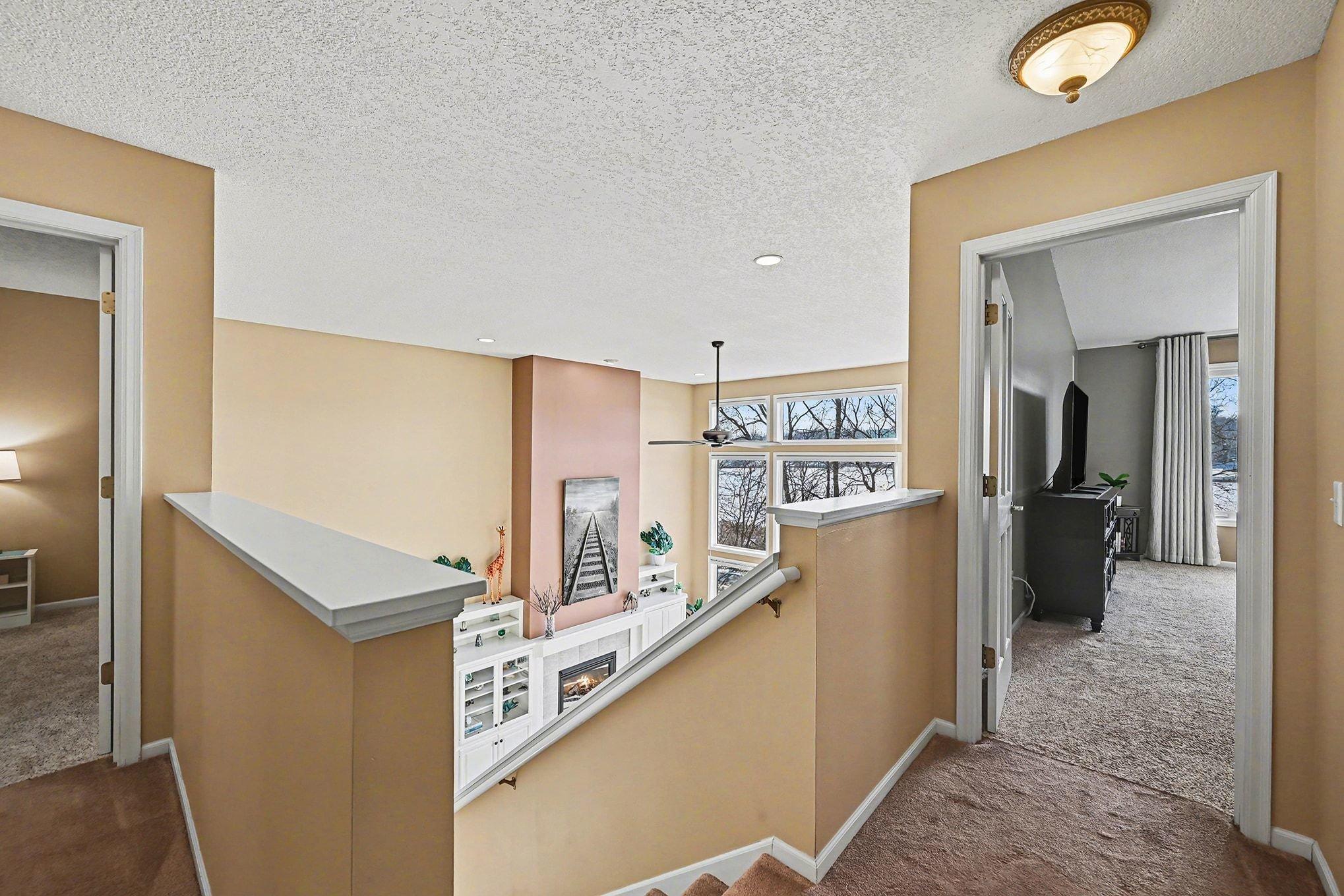 Stairs lead to 2 bedrooms up