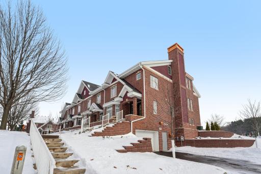 Beautifully designed townhome community showcasing consistent architecture and thoughtful site planning.