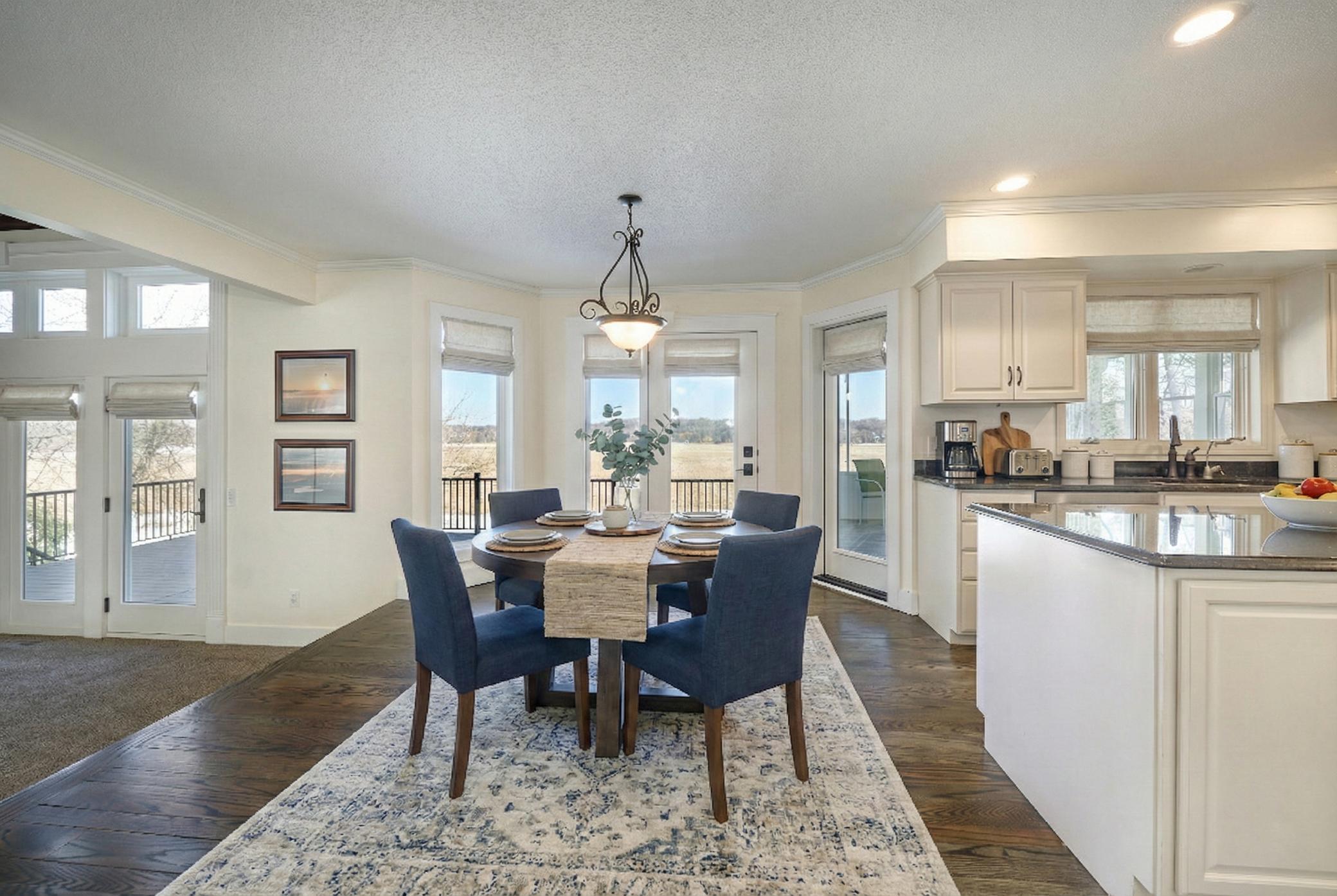Informal Dining Room opens to the 3 Season Porch and the Maintenance Free Deck