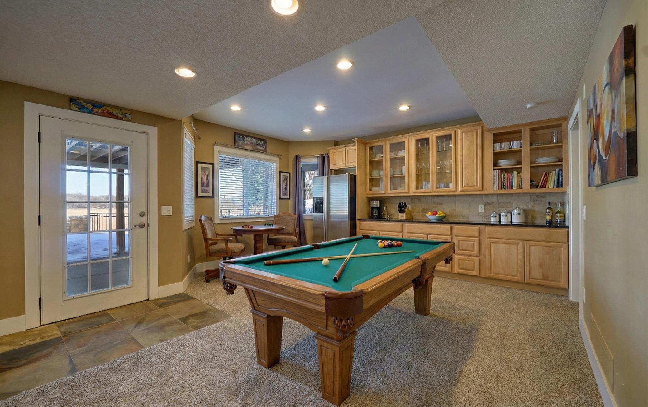 Walkout Level Family Room with Built-in Cabinetry