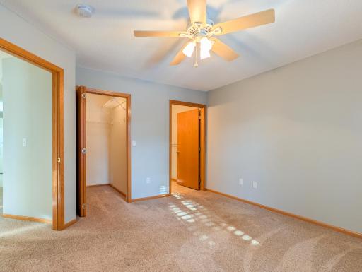 Primary bedroom has walk-in closet and attached bath