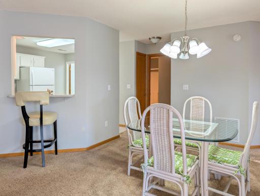 Informal dining area with kitchen passthrough