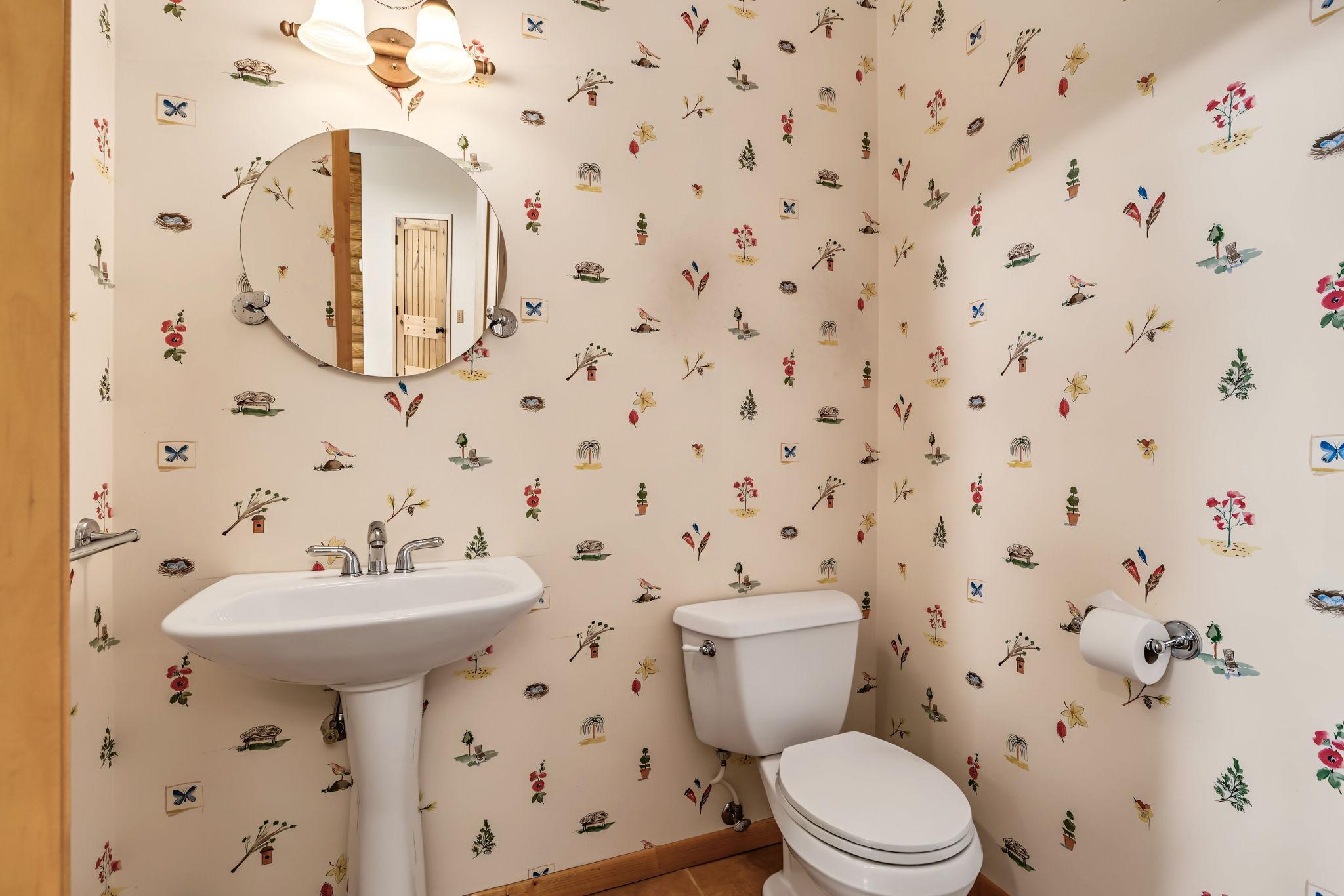 Convenient and adorable main level 1/2 bath.