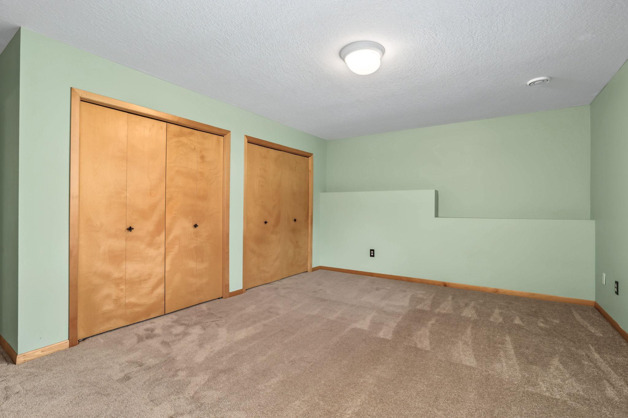 2nd bedroom on lower level with dual closets.