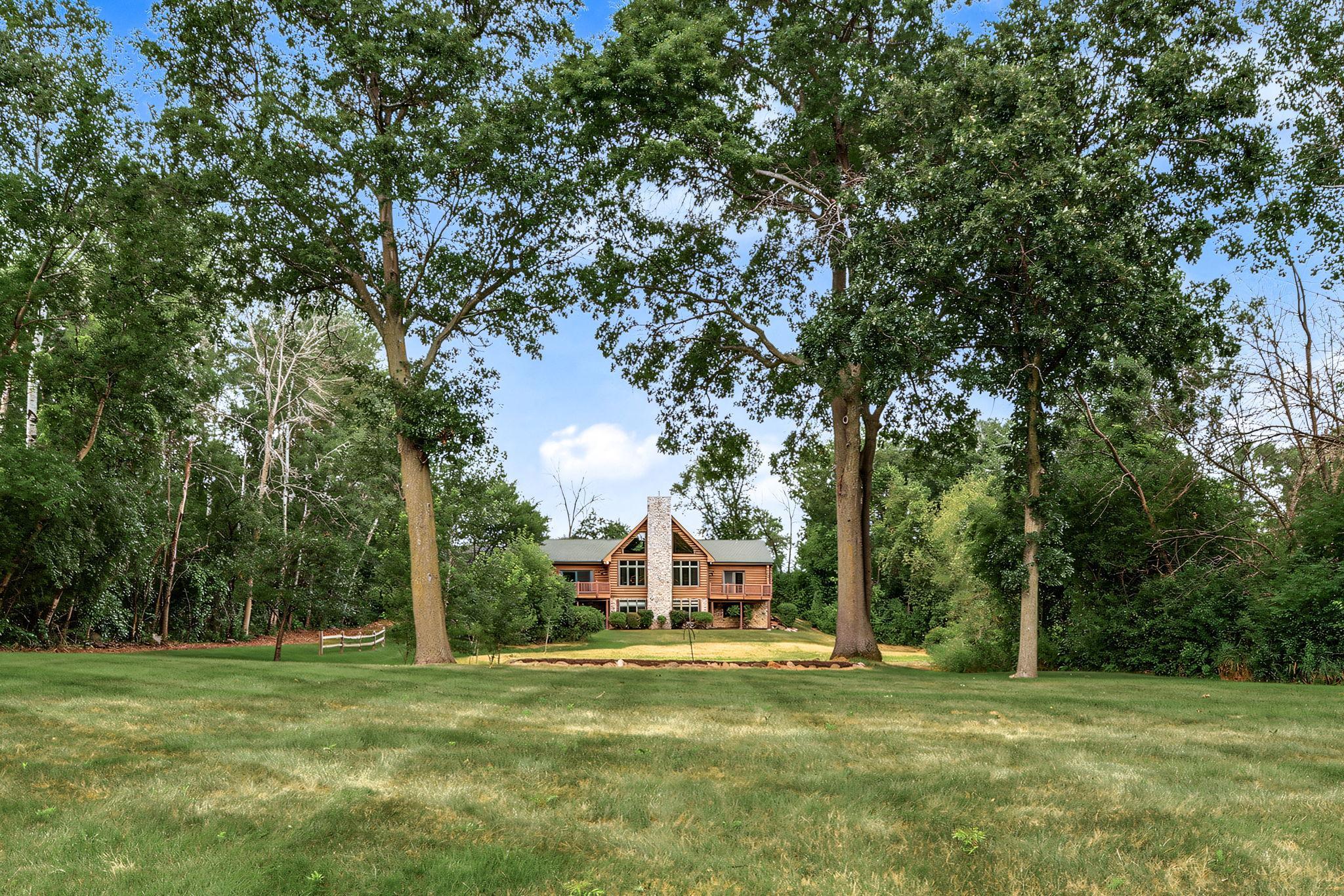 Welcome to 6294 Otter Lake Road. Perfectly situated on 1.47 acres with 160' of lakeshore on Otter Lake.