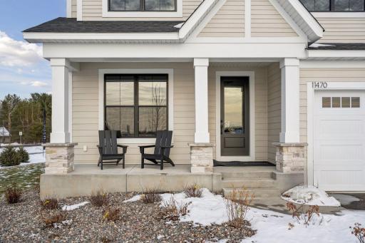 The Superior Sport features sleek and modern black in and out Marvin Windows. Stop by to see this stunning home which includes a two-story sport center!