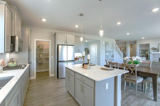 Stunning signature kitchen! *Photos of a similar home. Colors and options will vary.