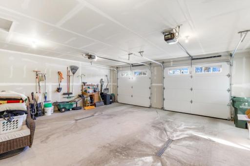Clean and heated 2 car garage with extra storage space