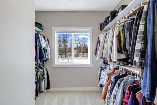 Spacious walk in closet in the primary bedroom