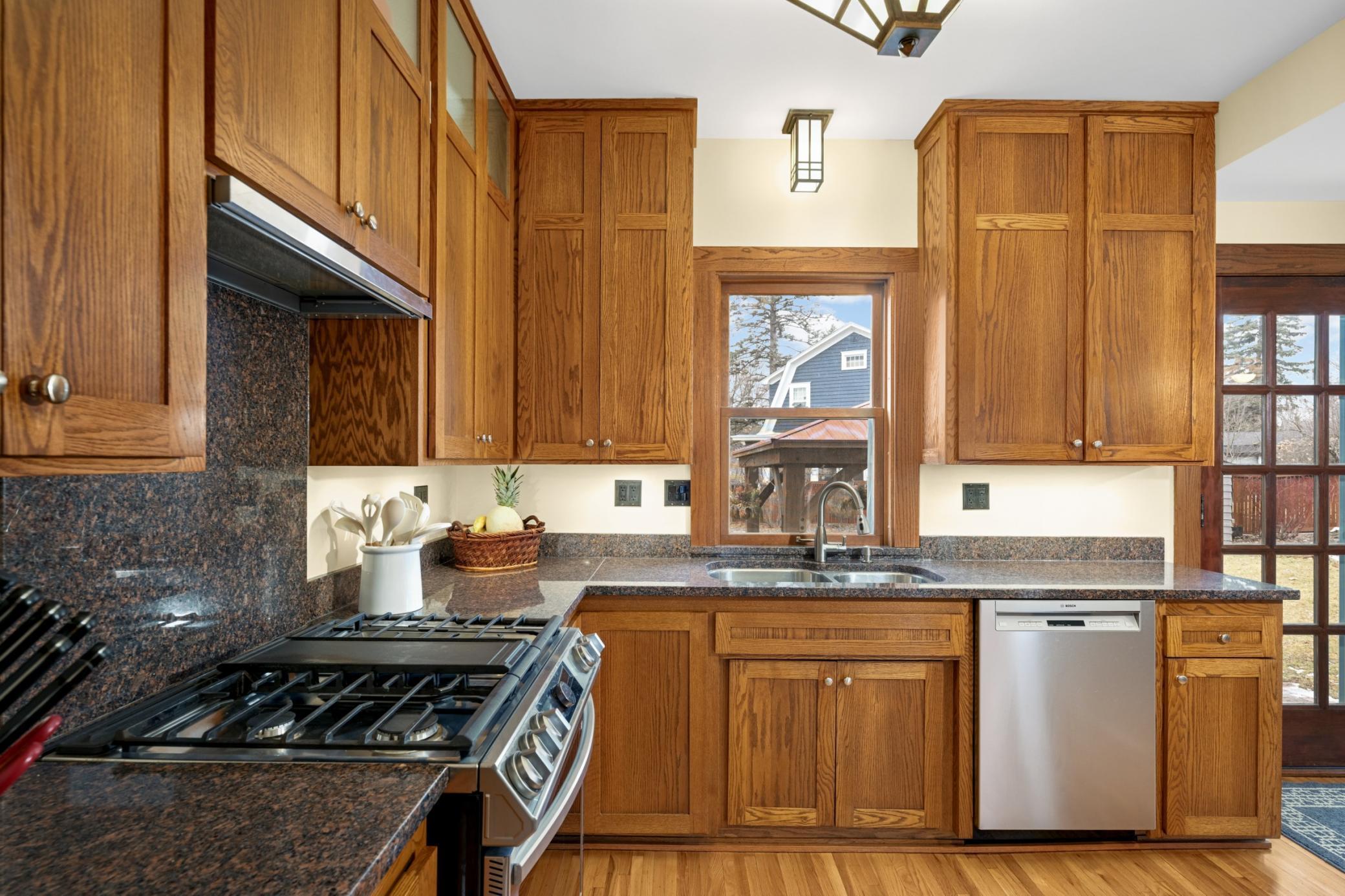 Kitchen has an open view to the backyard.