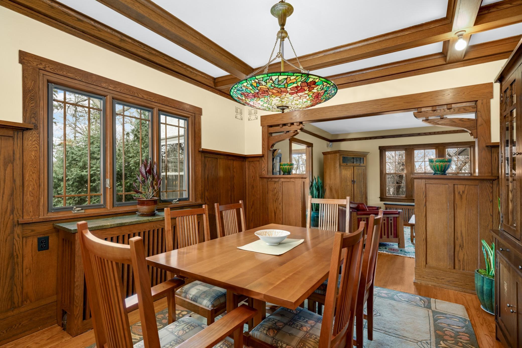 Dining Room with oak wainscotting and ceiling beams