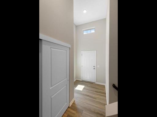 Photo of a different home with similar finishes and plan. Spacious Foyer.