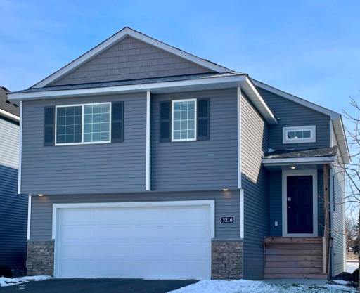 3216 Kady Ave NE- New Construction Home ready for Quick Move-in! Highlights include a Finished Lower Level with Walkout to backyard located on a no outlet street!