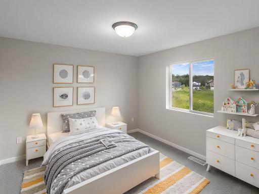 Virtually staged photo of a different home with similar finishes and plan. bedroom 2.