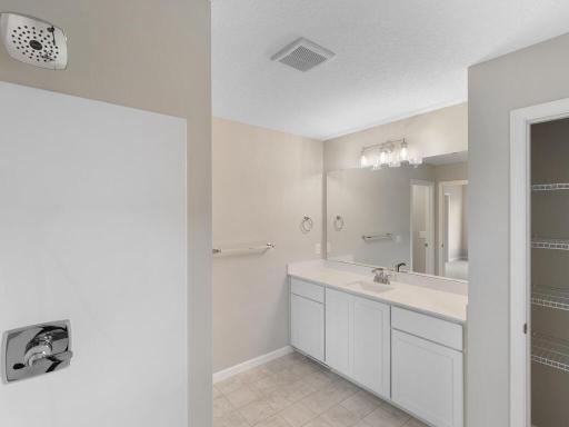 Photo of a different home with similar finishes and plan. Primary Suite Private Bath.