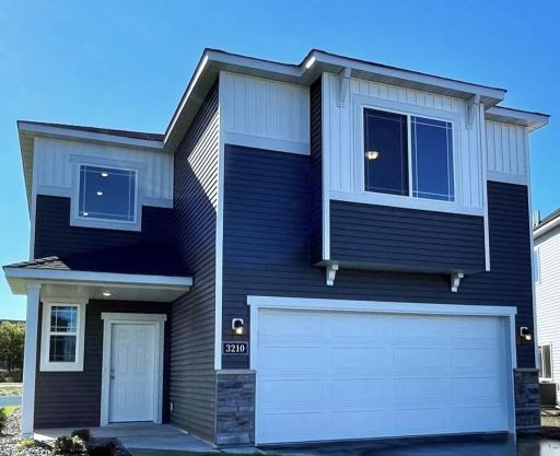 3210 Kady Ave NE- New Construction ready for quick move-in! Highlights include a main floor flex room PLUS a great room & versatile upper level loft plus 3 bedrooms located on a Cul-De-Sac homesite!