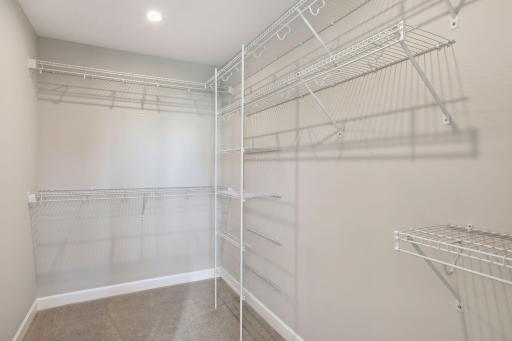 You will definitely stay organized with this walk in closet! (Pic of previous model)
