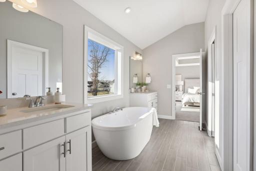 Elegantly tiled walk-in shower in ownerâs bathroom. (Pic of previous model)