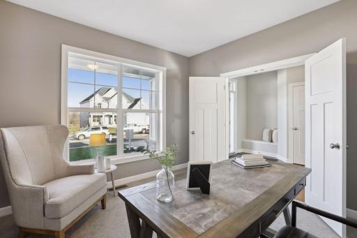 Just off the entry is a beautiful study, with views out the front of the home. (Pic of previous model)