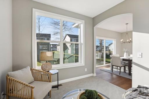 Just off the kitchen is the sun room. Use it as a reading nook or a place for your kids to play. (Pic of previous model)