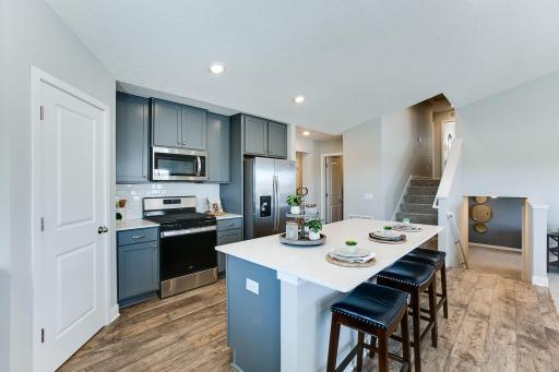 Welcome to the Finnegan! A fantastic new construction home with open concept design, and many great living features. Model home photo, colors and selections may vary.