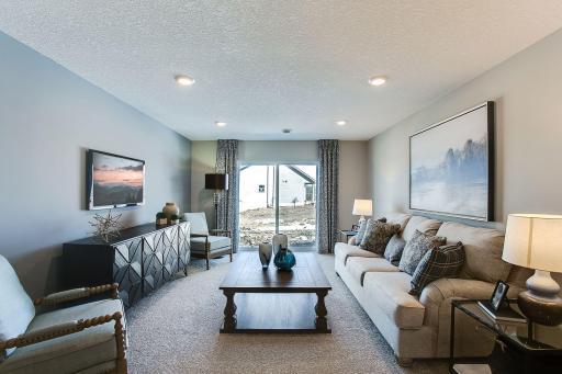 The lower level family room - comes FINISHED!