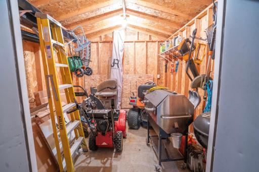 Storage shed on concrete slab with electricity & lighting