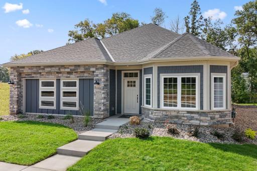 Beautiufl Exterior elevation with angled windows, 2 car garage to left of front door ( temporary office)