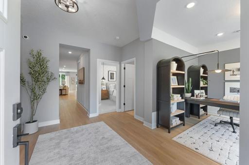 The front entry area is very spacious, with view of the den and second bed/bath, and hallway to kitchen.