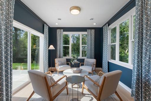 Just beyond the dining room is the morning room, a perfect place to enjoy a cup of coffee, read, or just relax.