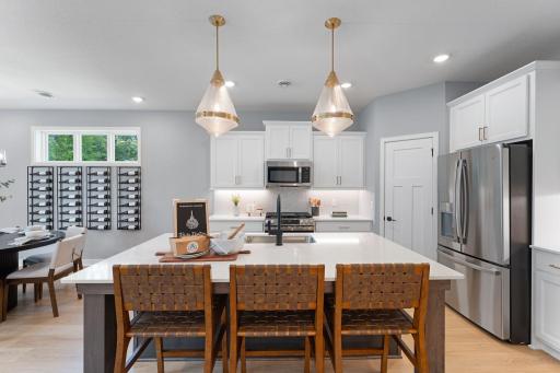 Stainless appliances by GE are included with every home. Corner pantry is perfect for extra storage area.