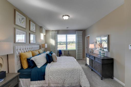 Primary Bedroom *Pictures are of model home, colors and finishes may vary. *