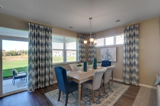 Massive dining room, perfect when having friends over for dinner or hosting a game night! *Pictures are of model home, colors and finishes may vary. *