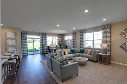 Large open living room, creating the perfect space to host friends and family. *Pictures are of model home, colors and finishes may vary. *