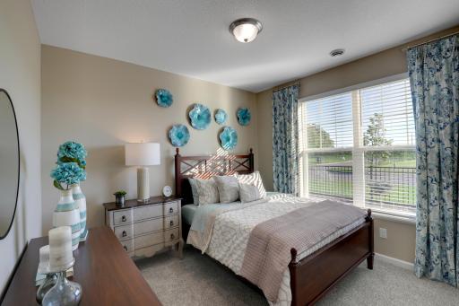 Front bedroom with large window supplying the room with TONS of natural light. *Pictures are of model home, colors and finishes may vary. *