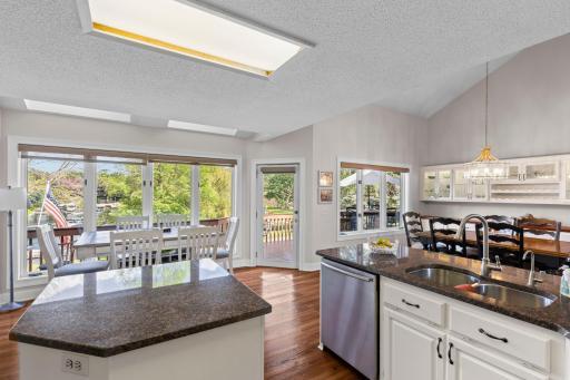 Kitchen is open to the dining area and informal dining area w/ views of the lake!