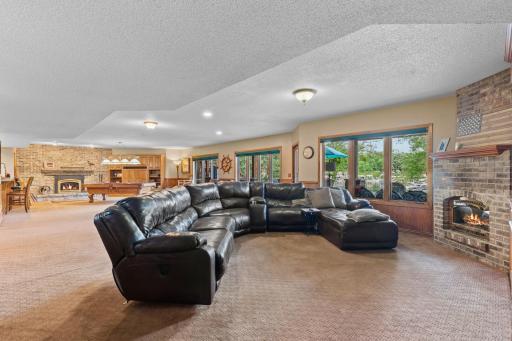 Amusement Area features another fireplace w/ brick surround