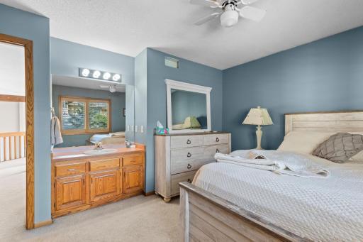Upper Level Bedroom 3 features vanity + sink and ceiling fan