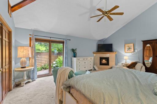 Master Bedroom on the Main Level features fireplace and door leading out to the backyard