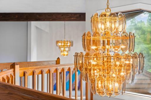 Upper Level features stunning chandelier