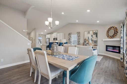 Perfectly positioned dining room. Model home photo, actual home will vary in finishes.