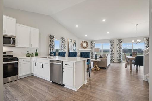 Open concept with vaulted ceilings are just two of the amazing features included in the Bryant II layout. *Picture is of model home; actual finishes may vary.