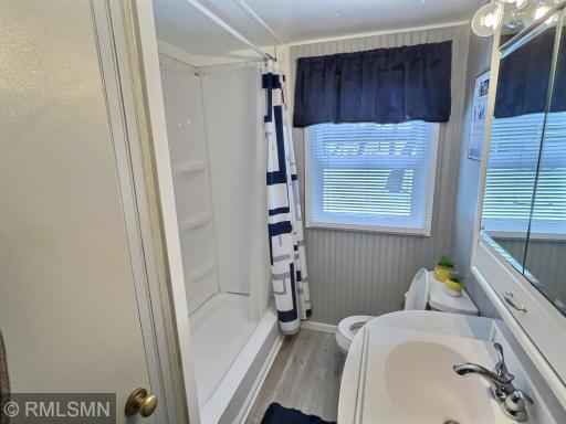 The home offers a spacious bathroom with walkin shower.