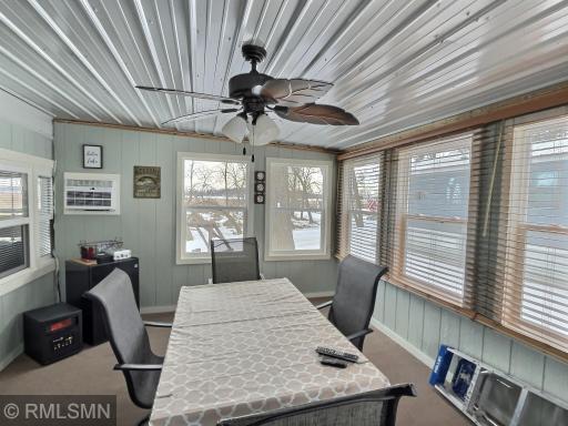 The Four season porch is a great place to enjoy life at the lake. You can use as a porch or a year around dining area or sitting area.exposio_133439194.jpg