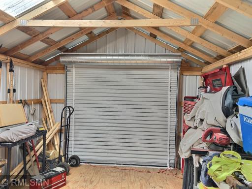 The garage has this roll-up door for easy access.