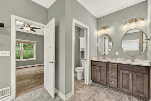 Primary En-suite complete with double sinks.jpg